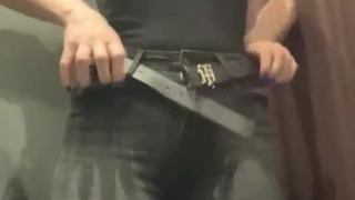 Hot MILF masturbates in the fitting room of the store